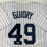 Autographed/Signed Ron Guidry New York Pinstripe Baseball Jersey Beckett BAS COA