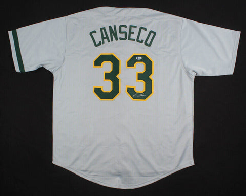 Jose Canseco Signed Athletics Jersey (Beckett COA) 2xWorld Series Champion