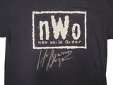 HULK HOGAN AUTOGRAPHED BLACK WWE NOW T-SHIRT "HOLLYWOOD" JSA STOCK #228799