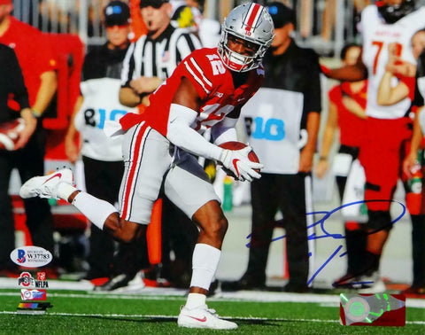 Denzel Ward Autographed OSU Buckeyes 8x10 Running W/ Ball PF Photo- Beckett Auth