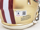 FRED WARNER AUTOGRAPHED 49ERS GOLD SPEED MINI HELMET BECKETT WITNESS 216804