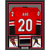 Framed Autographed/Signed Sebastian Aho 35x39 Carolina Black Jersey JSA COA