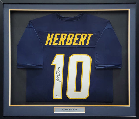 CHARGERS JUSTIN HERBERT AUTOGRAPHED FRAMED BLUE JERSEY BECKETT 200923