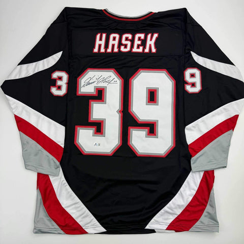 Autographed/Signed Dominik Hasek Buffalo Black Hockey Jersey Beckett BAS COA