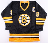 Johnny Bucyk Signed Bruins Captain Jersey Inscribed "H.O.F. 1981" (JSA COA)