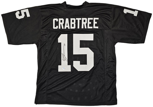 Michael Crabtree Autographed and Framed White Raiders Jersey