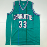 Autographed/Signed Alonzo Mourning Charlotte Teal Basketball Jersey JSA COA