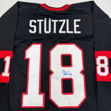 Autographed/Signed Tim Stutzle Ottawa Black Hockey Jersey JSA COA