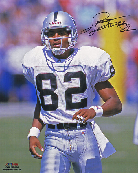 James Jett Signed Raiders White Jersey Running 8x10 Photo - (SCHWARTZ COA)