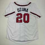 Autographed/Signed Marcell Ozuna Atlanta White Baseball Jersey Beckett BAS COA