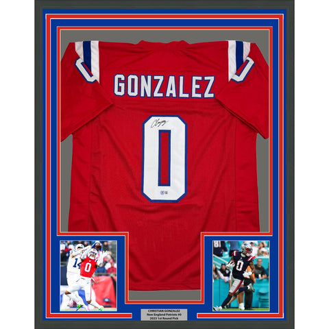 Framed Autographed/Signed Christian Gonzalez 35x39 NE Red Jersey Beckett BAS COA