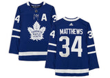 AUSTON MATTHEWS Autographed "2022 Hart" Authentic Blue Captain Jersey FANATICS