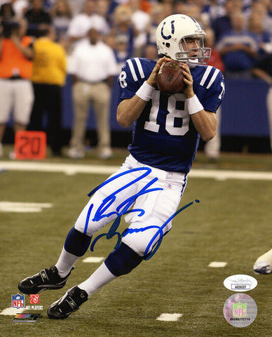 Peyton Manning Signed Colts Blue Jersey Drop Back Action 8x10 Photo - (JSA COA)