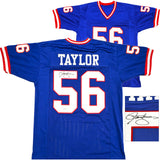 NEW YORK GIANTS LAWRENCE TAYLOR AUTOGRAPHED BLUE JERSEY BECKETT WITNESS 233740