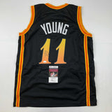 Autographed/Signed Trae Young Atlanta Black City Basketball Jersey JSA COA