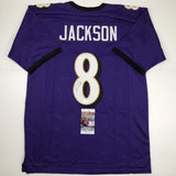 Autographed/Signed LAMAR JACKSON Baltimore Purple Football Jersey JSA COA Auto