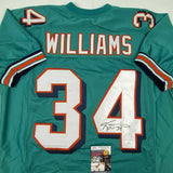 Autographed/Signed RICKY WILLIAMS Miami Teal Football Jersey JSA COA Auto