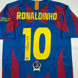 Autographed/Signed Ronaldinho Barcelona Blue/Red Soccer Jersey Beckett BAS COA