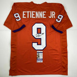 Autographed/Signed TRAVIS ETIENNE Clemson Orange College Football Jersey JSA COA