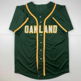 Autographed/Signed Rickey Henderson Oakland Green Jersey Beckett BAS COA