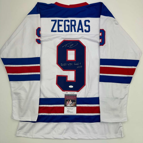 Autographed/Signed Trevor Zegras "2021 WJC Gold & MVP" USA White Jersey JSA COA