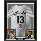 Framed Autographed/Signed Ozzie Guillen 33x42 Chicago Pinstripe Jersey JSA COA