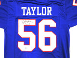 NEW YORK GIANTS LAWRENCE TAYLOR AUTOGRAPHED BLUE JERSEY BECKETT WITNESS 233740