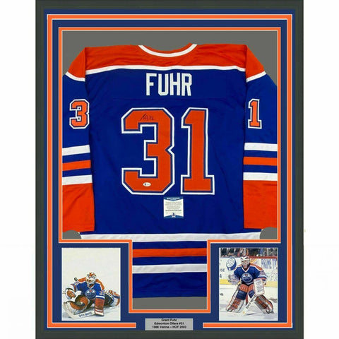 FRAMED Autographed/Signed GRANT FUHR 33x42 Edmonton Blue Jersey Beckett BAS COA