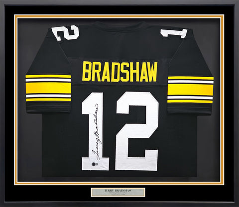 STEELERS TERRY BRADSHAW AUTOGRAPHED FRAMED BLACK JERSEY BECKETT WITNESS 235668