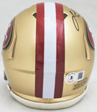 FRED WARNER AUTOGRAPHED 49ERS GOLD SPEED MINI HELMET BECKETT WITNESS 216804