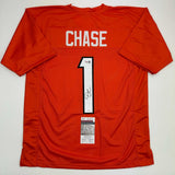 Autographed/Signed Ja'Marr Chase Cincinnati Orange Football Jersey Beckett COA