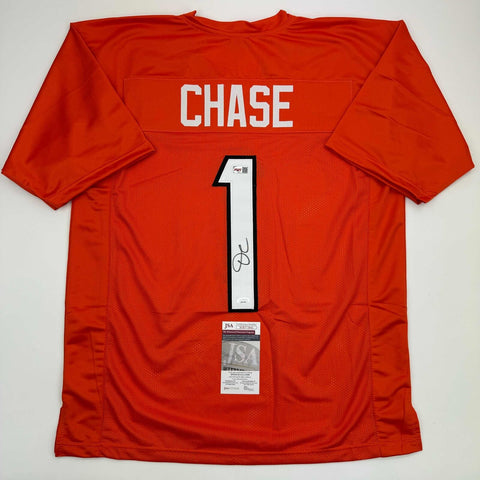 Autographed/Signed Ja'Marr Chase Cincinnati Orange Football Jersey Beckett COA