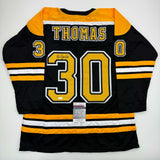 Autographed/Signed Tim Thomas Boston Black Hockey Jersey JSA COA