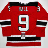 Autographed/Signed Taylor Hall New Jersey Red Hockey Jersey JSA COA