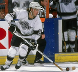 Luc Robitaille Signed Los Angeles Kings Logo Puck Inscribed "#20 Retired" (COJO)