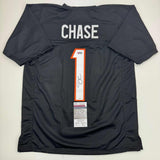 Autographed/Signed Ja'Marr Chase Cincinnati Black Football Jersey Beckett COA