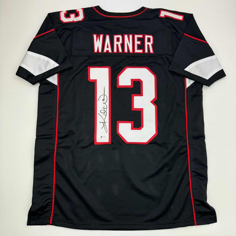 Autographed/Signed Kurt Warner Arizona Black Football Jersey Beckett BAS COA