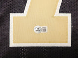 NEW ORLEANS SAINTS TAYSOM HILL AUTOGRAPHED BLACK & GOLD JERSEY BECKETT QR 229528