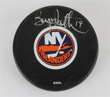 Bryan Trottier Signed New York Islander Logo Puck (JSA COA) 524 Goals 1975-1994