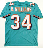 Ricky Williams Autographed Teal Pro Style Jersey- JSA W Authentication *Across 4