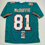 Autographed/Signed O.J. OJ McDuffie Miami Teal Football Jersey JSA COA