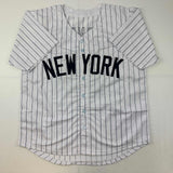 Autographed/Signed Andruw Jones New York Pinstripe Baseball Jersey JSA COA