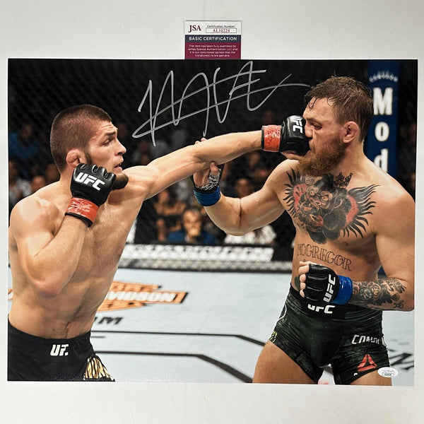 Autographed/Signed Khabib Nurmagomedov vs. Conor McGregor 16x20 Photo JSA COA #2