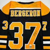 Autographed/Signed Patrice Bergeron Boston Black Hockey Jersey PSA/DNA COA