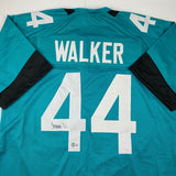 Autographed/Signed Travon Walker Jacksonville Teal Football Jersey Beckett COA