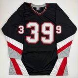 Autographed/Signed Dominik Hasek Buffalo Black Hockey Jersey Beckett BAS COA