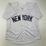 Autographed/Signed Johnny Damon New York Pinstripe Baseball Jersey Beckett COA