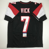 Autographed/Signed MICHAEL MIKE VICK Atlanta Black Football Jersey PSA/DNA COA