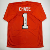 Autographed/Signed Ja'Marr Chase Cincinnati Orange Football Jersey JSA COA