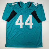 Autographed/Signed Travon Walker Jacksonville Teal Football Jersey Beckett COA